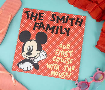 Square sign for Disney Cruise with Mickey Mouse and text "The Smith Family. Our first cruise with the mouse!"