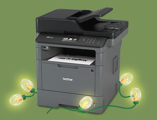 Brother All-in-one printer on green background with Christmas lights.