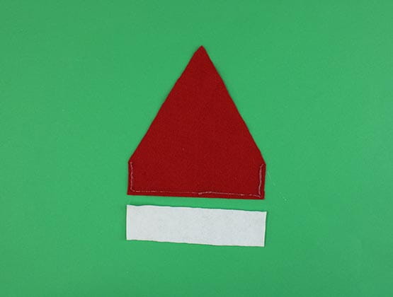 Red felt triangle and white felt rectangle